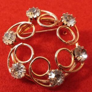 Vintage Gold tone metal, Circular Swirl Rhinestone Brooch Cottagecore